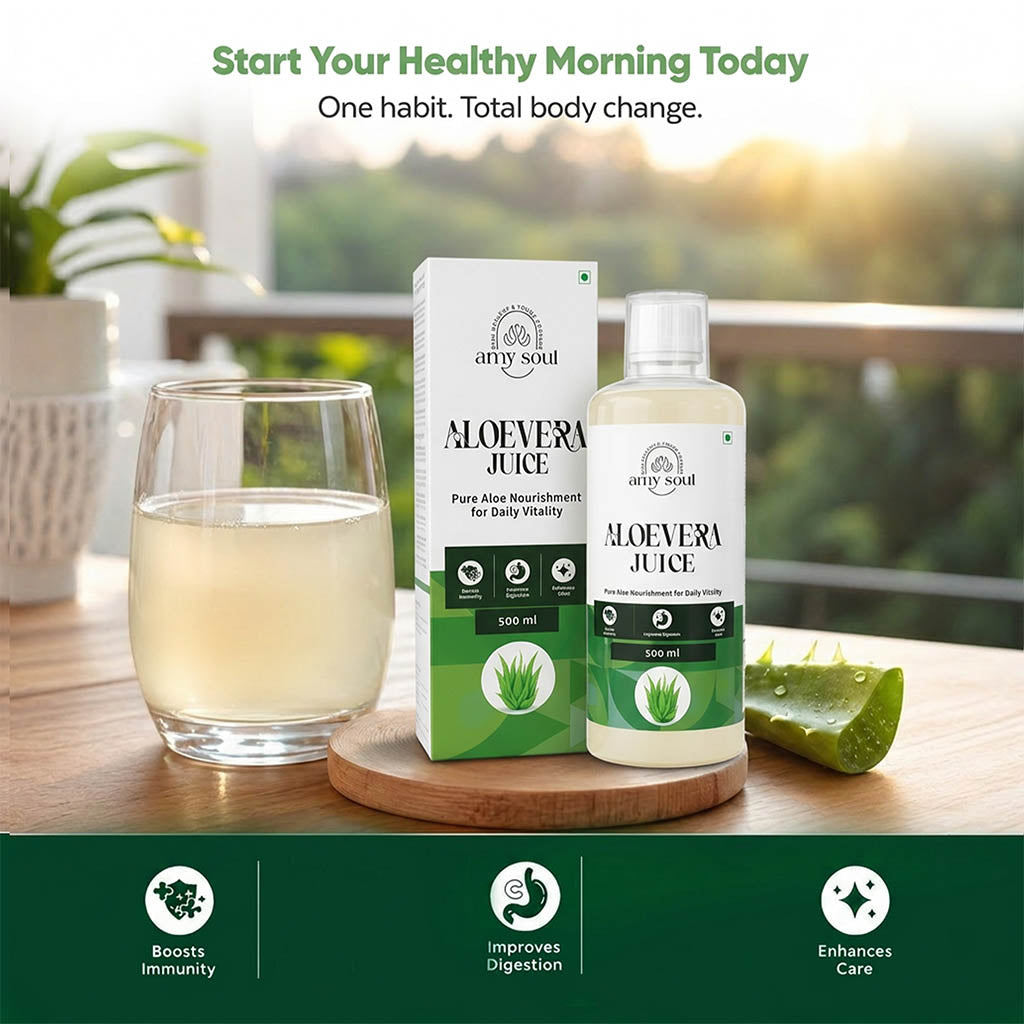 Aloe vera juice packaging and glass on a wooden surface with a blurred green outdoor background.