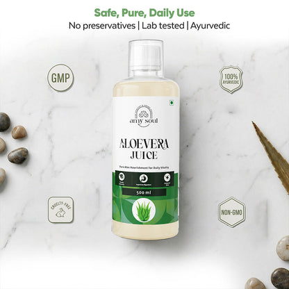 Bottle of Aloe Vera Juice with green label on a marble background