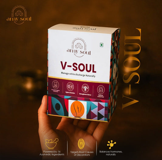 Box of 'V-SOUL' by 'amy soul' held in a hand with a dark background